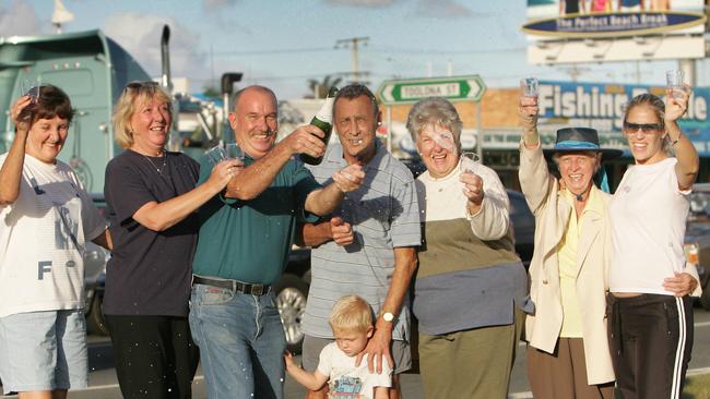 Jubilant Adina Ave residents Denise Johnson, Pam and Rod Peters, Jim Johnson and Jack 2 1/2yrs, Lesley Rosenstrauss, Margaret Sell and Carly Reid after finding out their houses would not be demolished.