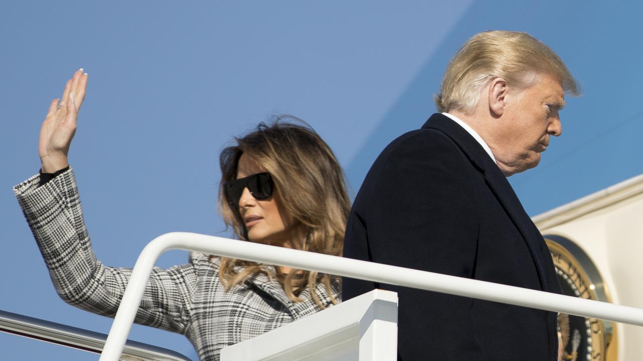 President Donald Trump and first lady Melania Trump board Air Force One. Picture: AP