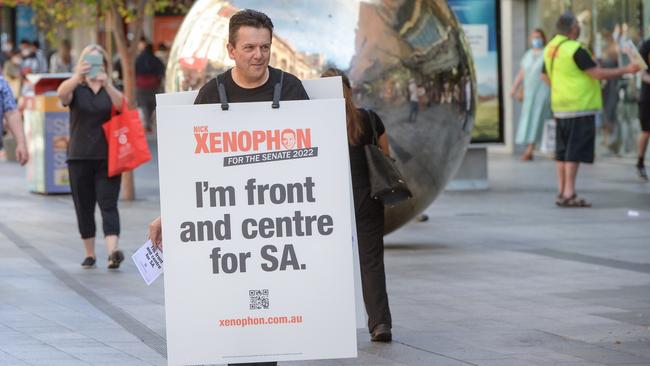 Nick Xenophon handing out election pamphlets in Rundle Mall on Sunday to drum up support for his latest federal senate bid. Picture: Brenton Edwards