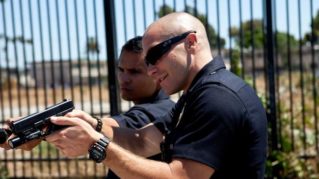 Jake Gyllenhaal, right, and Michael Pena as LAPD officers in End of Watch.