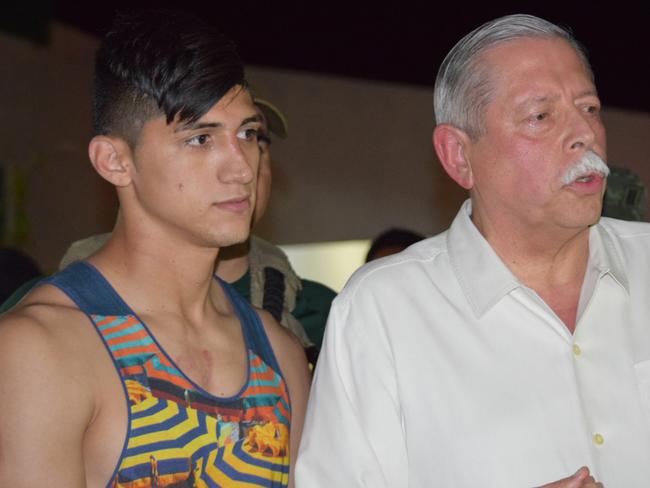 Mexican footballer Alan Pulido, left, stands next to Tamaulipas State Gov. Egidio Torre Cantu after Pulido was rescued from kidnappers.