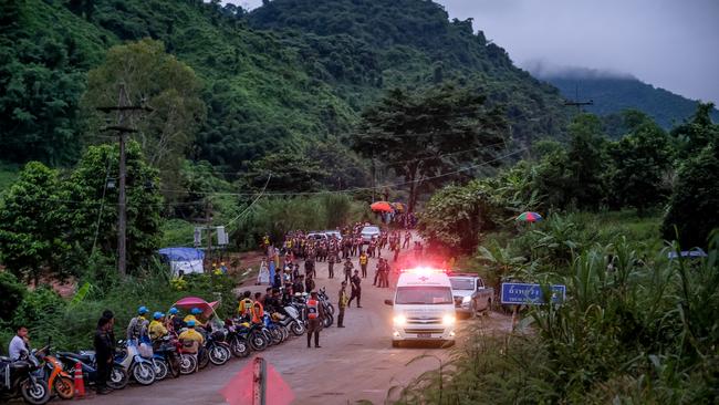 An ambulance carrying one of the rescued boys heads towards the hospital. Picture: Getty Images.