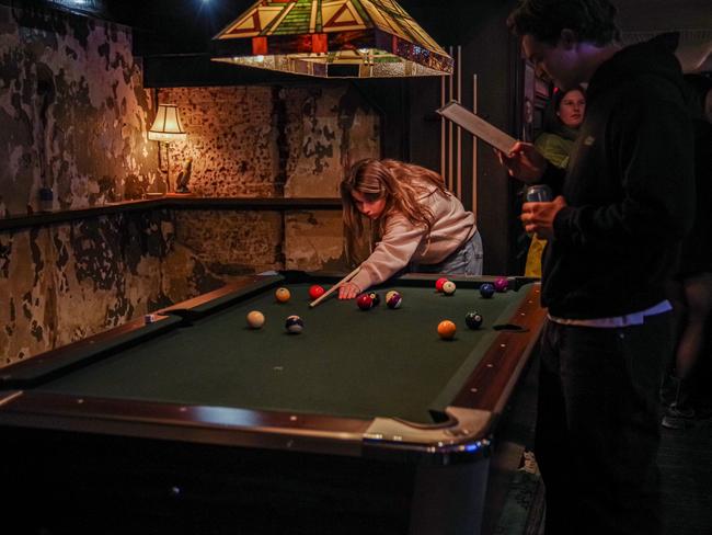 Patrons enjoy a game of pool at Old Mates, the new Aussie pub in New York. Picture: Matt Davies