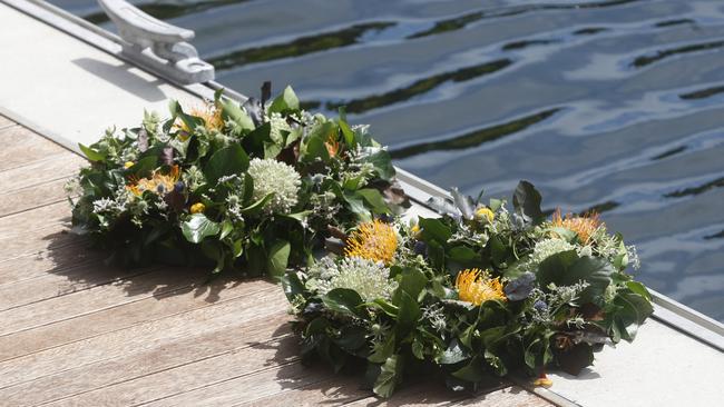 Wreaths laid in tribute at Constitution Dock Hobart to Nick Smith, crew member of yacht Bowline and Roy Quaden, crew member of yacht Flying Fish Arctos. Picture: Nikki Davis-Jones