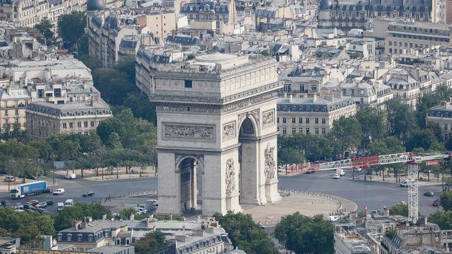 A photograph taken on July 15, 2020, from the top of the Eiffel Tower shows an aerial view of Paris, with the Arc de Triomphe. (Photo by THOMAS SAMSON / AFP)