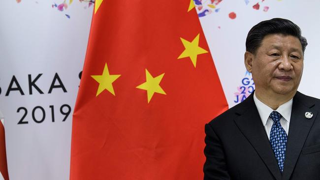 China's President Xi Jinping waits for a meeting with US President Donald Trump. Picture: AFP