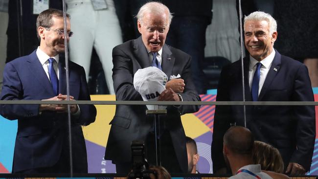 Joe Biden at the opening ceremony of the Maccabiah Games in Jerusalem with Israeli President Isaac Herzog, left, and Yair Lapid on Thursday night. Picture: AFP