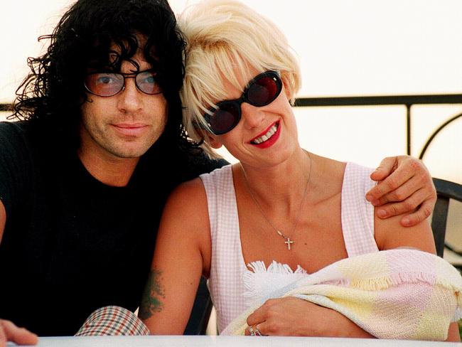 Aust rock singer Michael Hutchence with Paula Yates and their baby daughter Heavenly Hiraani Tiger Lily in Sydney.