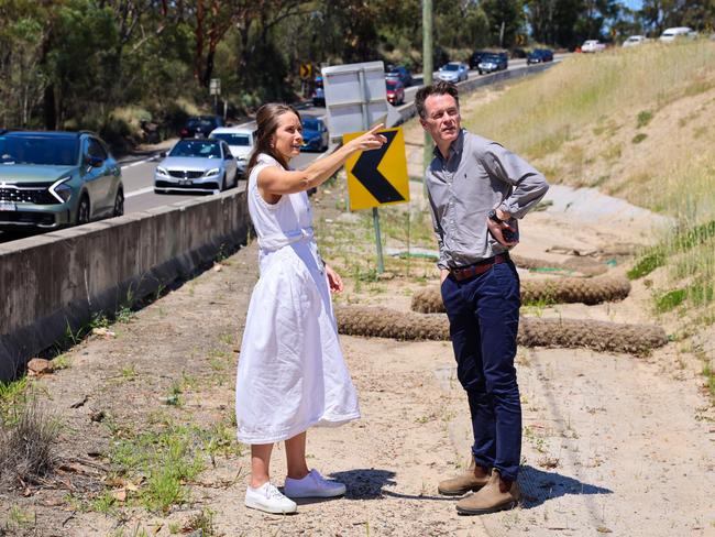 New independent MP Jacqui Scruby shows NSW Premier Chris Minns unfinished work on the $340m Mona Vale Rd West upgrade, which has been put on the budget backburner for two years. Picture: Supplied