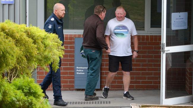 A friend gives Michael Murphy his support at Buninyong Police Station. Picture: NCA NewsWire / Ian Wilson