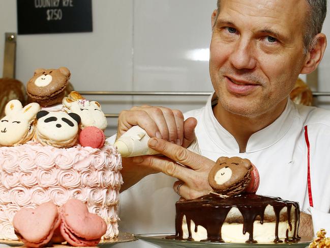 Pastry Chef Francois Galand among sweet treats at his Bondi shop , Francois Artisan Bakery. He is  planning to offer a range of made-to-order cakes and pastries online. Picture: John Appleyard