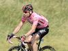 Overall leader Cadel Evans of Australia, second from left, pedals with his teammates during the 10th stage of the Giro d'Italia, Tour of Italy cycling race, from Modena to Salso Maggiore, Italy, Tuesday, May 20, 2014. (AP Photo/Fabio Ferrari)