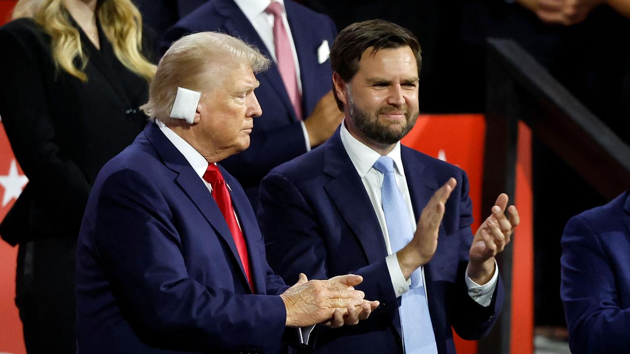 Republican presidential candidate Donald Trump next to US Senator from Ohio and 2024 Republican vice-president candidate J. D. Vance. (Photo by KAMIL KRZACZYNSKI / AFP)