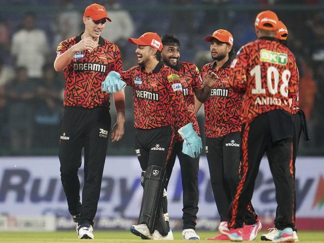 Sunrisers Hyderabad's captain Pat Cummins, left, Ishan Kishan and teammates celebrate after winning the Indian Premier League cricket match against Kolkata Knight Riders. (AP Photo/Manish Swarup)