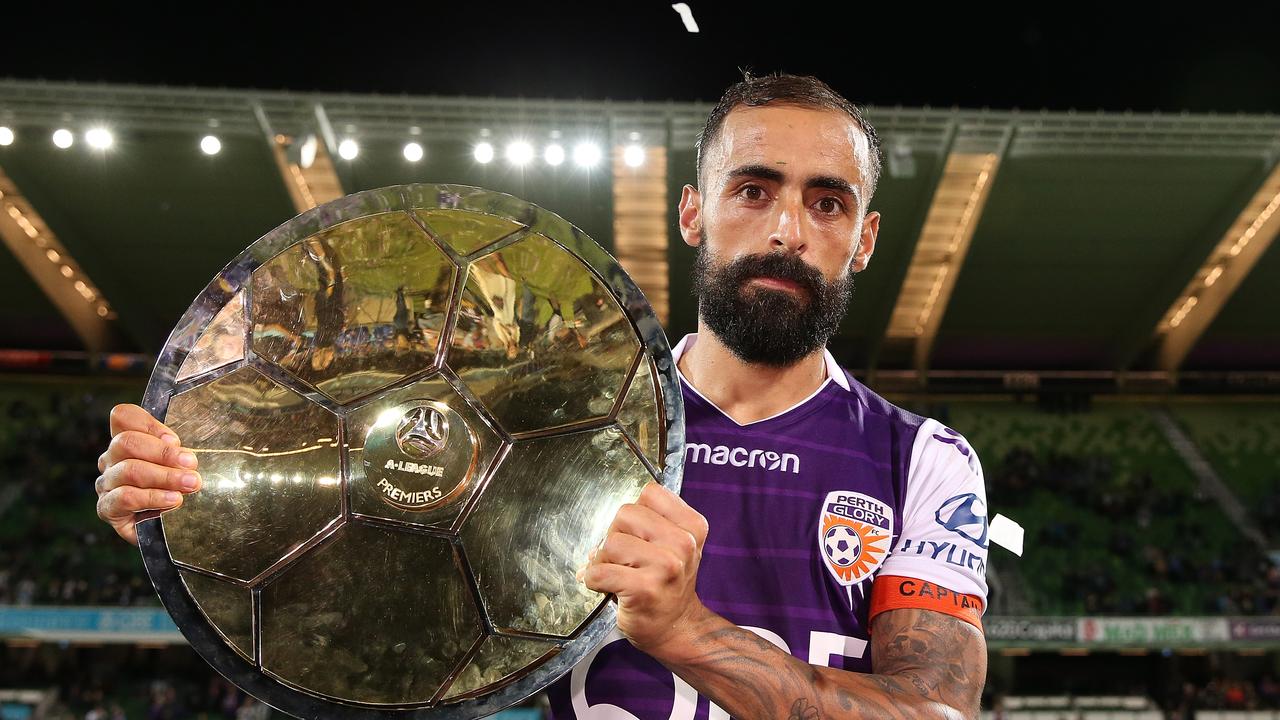 Diego Castro of the Glory poses with the Premiership Plate
