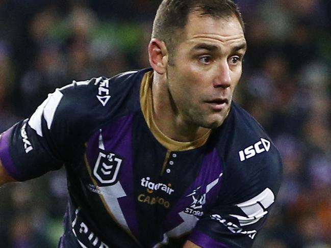 Cameron Smith of the Storm passes the ball during the Round 17 NRL match between the Melbourne Storm and the Cronulla Sharks at AAMI Park in Melbourne, Saturday, July 13, 2019.  (AAP Image/Daniel Pockett) NO ARCHIVING, EDITORIAL USE ONLY