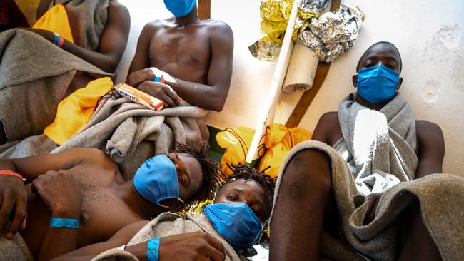 Migrants on board the Sea-Watch 4 rescue ship after it took more than 150 people from the MV Louise Michel rescue vessel funded by Banksy. Picture: AFP