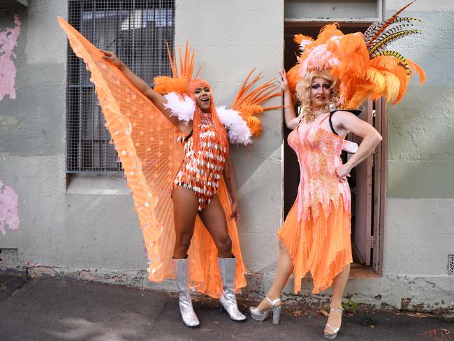 Leonardo Magalhaes and his boyfriend Gavin Curtis were resplendent in orange. Picture: Tracey Nearmy