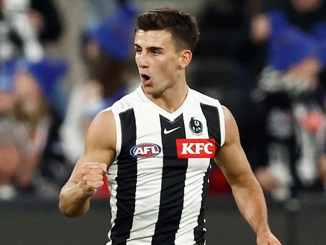 MELBOURNE, AUSTRALIA - JUNE 12: Nick Daicos of the Magpies celebrates a goal during the 2023 AFL Round 13 match between the Melbourne Demons and the Collingwood Magpies at the Melbourne Cricket Ground on June 12, 2023 in Melbourne, Australia. (Photo by Michael Willson/AFL Photos via Getty Images)