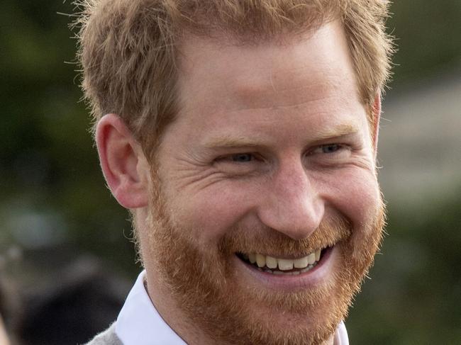 Britain's Prince Harry, Duke of Sussex gestures during a visit to the Rugby Football Union (RFU) All Schools programme at Lealands High School in Luton, south east Bedfordshire on September 12, 2019. (Photo by ARTHUR EDWARDS / various sources / AFP)