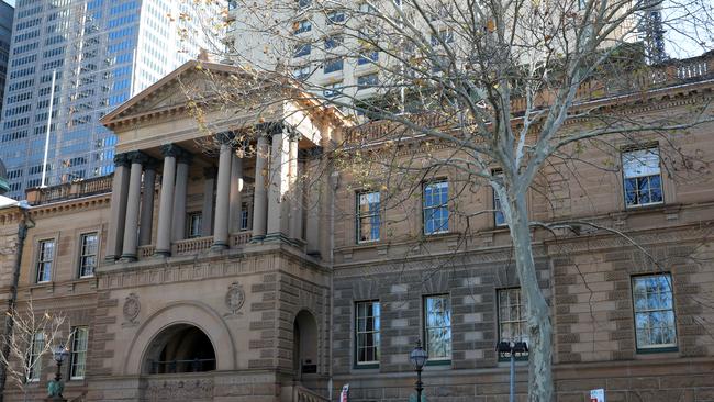 NSW has placed strict new limits on the number of overseas travellers allowed to land in the state as its hotel quarantine system comes under strain (pictured, The InterContinental Hotel). Picture by Damian Shaw