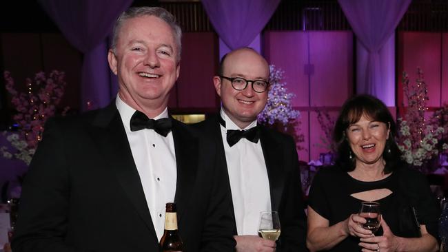 Hugh Marks, Brad Hatch and Gail Hambly at the mid-winter ball at Parliament House in Canberra. Picture Gary Ramage