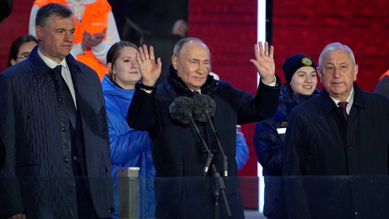 Vladimir Putin celebrates presidential election victory