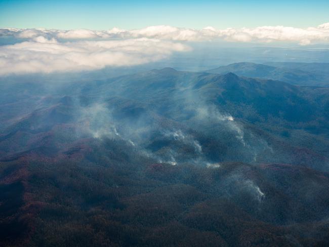 2019 Tasmanian bush fires. Spot fires looking towards Wylds Crag, Gell River Fire - at Southwest National Park. . Picture - LUKE TSCHARKE / PAR AVION