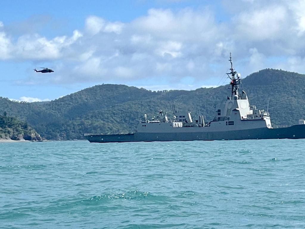 At sea, helicopters can be seen carrying debris while it's understood Police Boat Damian Leeding and a Volunteer Marine Rescue boat Midge Point have also retrieved debris.