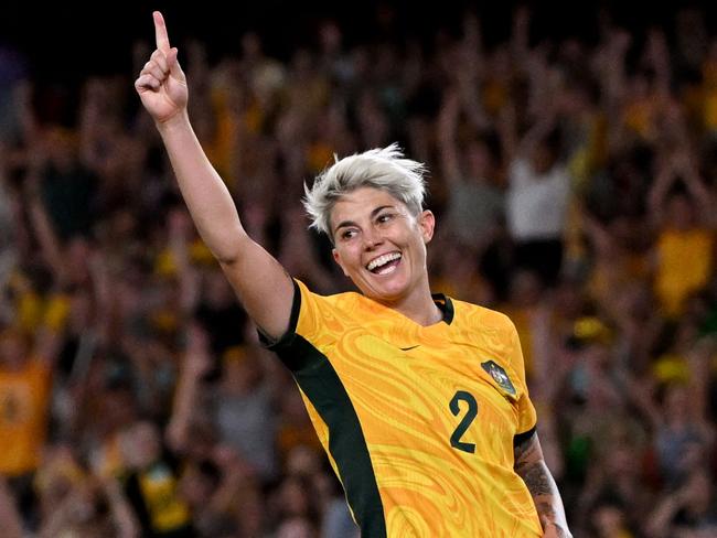 Michelle Heyman is all smiles after scoring for the Matildas against Uzbekistan in February. Picture: William West/AFP