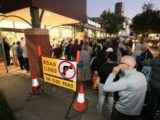 Elderly shoppers queue outside Woolworths in Moonee Ponds before it opened at 7am.via The Australian.