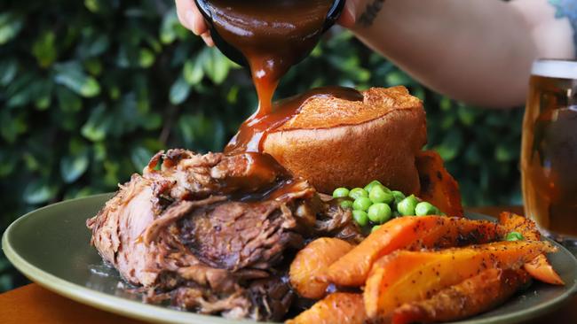 Dove &amp; Olive’s Sunday roast with a pint. Picture: Jenifer Jagielski