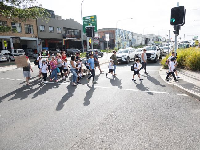 A group of locals at Campbell St, St Peters, protesting the need for a school zone.