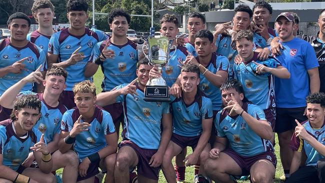 Harvey Smith, holding the trophy to the right, with big Lennox Whaiapu on the left of the trophy. The boys had a big grand final day - after a big season.