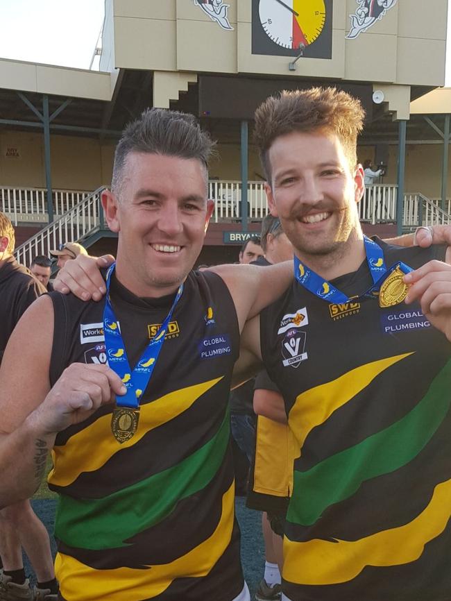 Matt Price (left) and Dan Geurts celebrate Dromana's 2018 premiership.