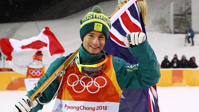 Silver medalist Matt Graham of Australia celebrates in the Freestyle Skiing Men's Moguls Final.o