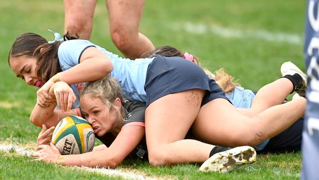 Australian Schools Rugby Championships. NSW Blue U16 v NSW Grey U16 match, NSW Grey player Tess Elmslie scoring. Photo Jeremy Piper