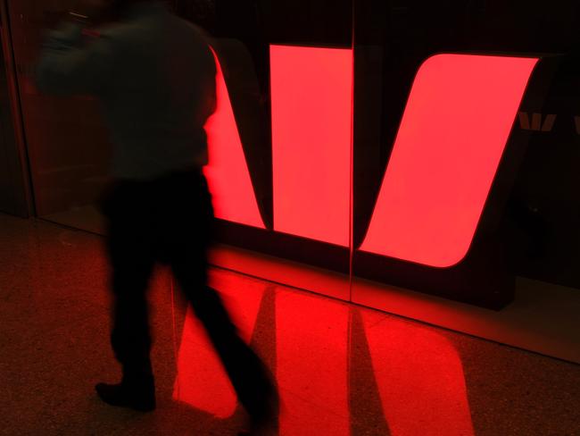 The Westpac Bank logo is reflected on the floor of a shopping centre in Sydney, 28/07/2011.