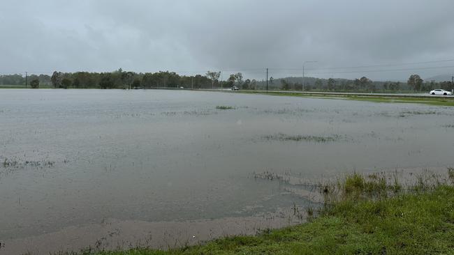 Water was rapidly rising along the Peak Downs Highway at Eton, west of Mackay, as many questioned whether they would be able to drive out to the mines. January 14, 2023. Picture: Heidi Petith