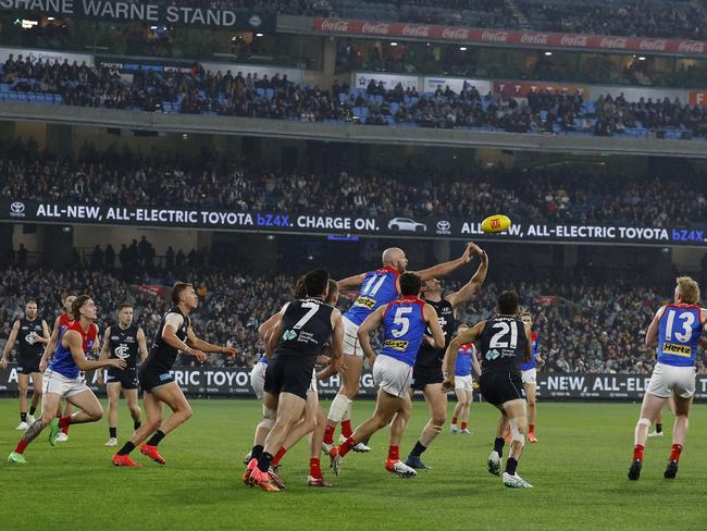 There was plenty of congestion around the footy in the Blues and Dees clash. Picture: Michael Klein