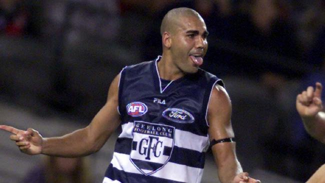 23.2.2001. Justin Murphy (left) and teammate Kent Kingsley.  Geelong v Essendon second-round Ansett Cup match at Colonial Stadium. Justin Murphy enjoys a goal.  football.