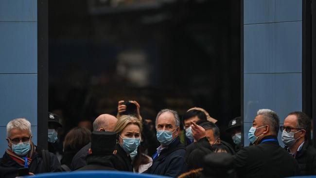 WHO-led team members investigating the coronavirus’s origins visit the closed Huanan seafood market in Wuhan, China, in January. Picture: AFP