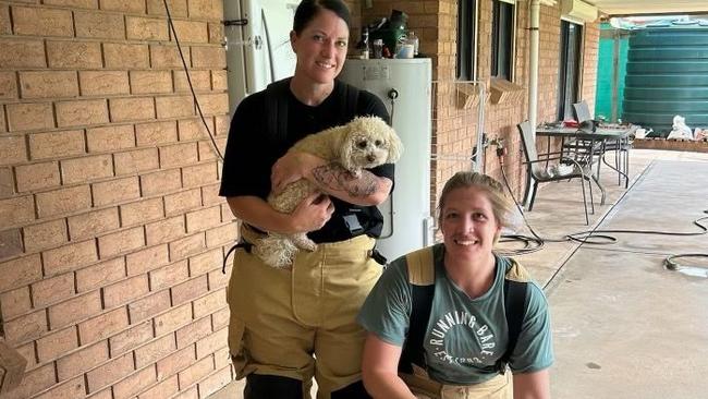 Port Augusta CFS members Lisa Kruger and Kelsey Ellis, with rescued dogs Bella and Lacey. Picture: CFS.