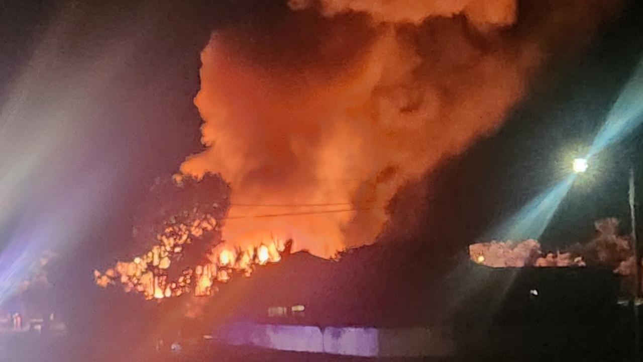 Smoke can be seen pouring from a blaze that gutted a backpacker lodge in Bowen. Picture: Maree Mac, posted on Facebook