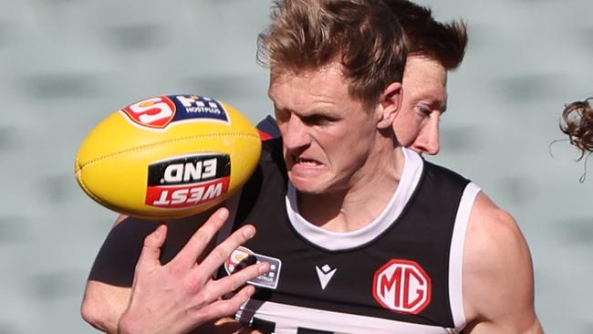 Port Adelaide ruckman Sam Hayes fights for possession against Crows counterpart Kieran Strachan at Adelaide Oval on Saturday. Picture: SANFL Image/David Mariuz.