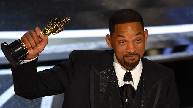 A tearful Smith accepts his Best Actor award. Picture: AFP