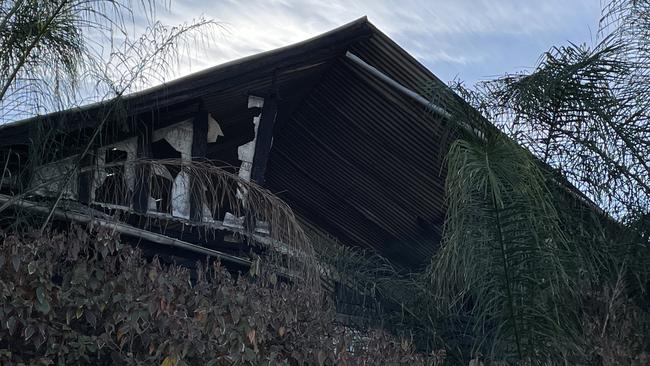 Fire crews spent the early hours of Wednesday morning battling flames that engulfed a historic Gympie in the heart of the city. House fire on Horseshoe Bend, Gympie on April 12, 2023. Picture: Christine Schindler