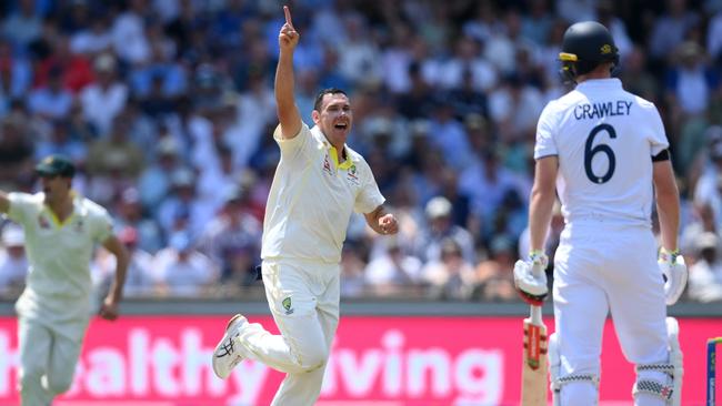 Scott Boland celebrates a wicket amid the scoring blitz on day one. Picture: Getty Images