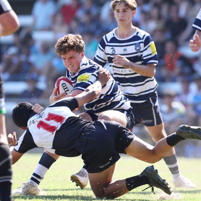 Rohan Nichol (with the ball). Action from the Under 16 Brisbane junior rugby league grand final between Brothers and Souths at Norman Park. Picture Lachie Millard