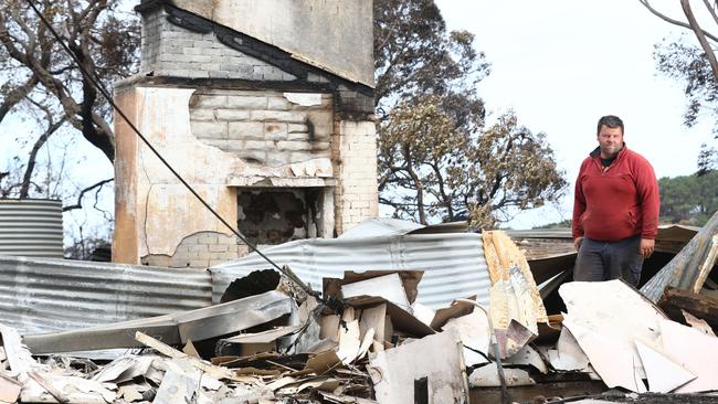 Jared McArdle of the Taljar Polwarth stud at Parndana lost two family homes in the fire and about 15 per cent of their sheep flock. Picture: Tait Schmaal